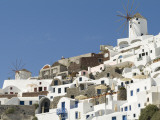 Stuccoed Houses and Windmills on a Hillside