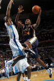 Utah Jazz v New Orleans Hornets: Paul Millsap and Emeka Okafor