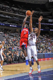 Philadelphia 76ers v New Jersey Nets: Jrue Holiday and Derrick Favors