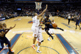 Buy Denver Nuggets v Charlotte Bobcats: Ty Lawson and Boris Diaw at AllPosters.com