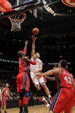 New Jersey Nets v Toronto Raptors: Linas Kleiza and Johan Petro