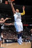 San Antonio Spurs v Denver Nuggets: Carmelo Anthony and Tim Duncan