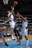 Minnesota Timberwolves v Dallas Mavericks: Corey Brewer, Tyson Chandler and Caron Butler