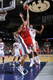 Philadelphia 76ers v New Jersey Nets: Spencer Hawes, Stephen Graham and Derrick Favors