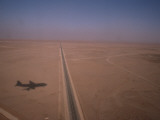 The Shadow of an Aircraft over the Saudi Desert
