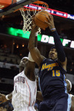 Buy Denver Nuggets v Charlotte Bobcats: Carmelo Anthony and Stephen Jackson at AllPosters.com