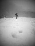 A Climber Climbs a Steep Snow Bank in the Wa Backcountry (Black/White)
