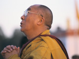 The Dalai Lama Prays During a Ceremony