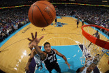 San Antonio Spurs v New Orleans Hornets: Tim Duncan and David West
