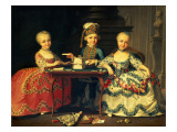 Group Portrait of a Boy and Two Girls Building a House of Cards with Other Games by the Table