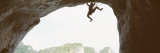 Silhouette of a Man Climbing a Rock, Railay Beach, Krabi, Thailand