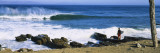 Surfer Standing on the Beach and Looking at Surf, Isla Natividad, Baja California, Mexico