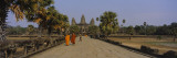 Two Monks Walking in Front of an Old Temple, Angkor Wat, Siem Reap, Cambodia