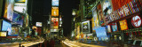 Neon Boards in a City Lit Up at Night, Times Square, New York City, New York, USA
