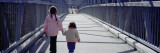 Two Little Girls Walking on a Bridge, Toronto, Canada