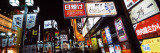 Commercial Signboards Lit Up at Night in a Market, Shinjuku Ward, Tokyo Prefecture, Japan
