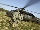 US Army Soldiers Prepare to Board a UH-60 Black Hawk Helicopter Photographic Print