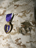 A Soldier Wears His Purple Heart on His Digital Camouflage Minutes after Being Awarded the Medal