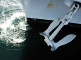 Buy The Port Side Mark II Stockless Anchor is Raised Aboard the Aircraft Carrier USS Abraham Lincoln at AllPosters.com