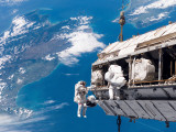 Buy STS-116 Mission Specialists Participate in the First of the Three Mission's Extravehicular Activity at AllPosters.com