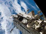 Buy Astronaut STS-116 Mission Specialist Participates in Extravehicular Activity at AllPosters.com