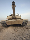 Buy An M-1A1 Main Battle Tank Casts a Daunting Image in the Desert Near Dra Digla, Iraq at AllPosters.com