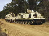 Buy An M-88 Recovery Vehicle Begins to Tow an M992 Field Artillery Ammunition Supply Vehicle at AllPosters.com