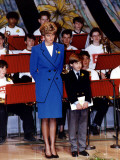 Buy Princess Diana dressed in blue with Prince William standing in front of a Welsh orchestra at AllPosters.com