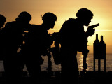 Buy Marines Fire 9mm Handguns on the Flight Deck of USS Peleliu at AllPosters.com