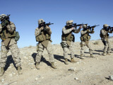 Buy Military Transistion Team Members Quickly Reload Their Rifles at AllPosters.com