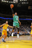 Boston Celtics v Golden State Warriors, Oakland, CA - February 22: Rajon Rondo and Stephen Curry