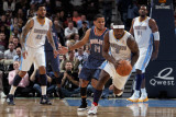 Charlotte Bobcats v Denver Nuggets, Denver, CO - March 02: Ty Lawson and D.J. Augustin