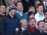Buy Prince William sings the National Anthem still wearing his wooly hat while his brother Harry does t at AllPosters.com