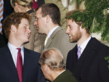 Prince William sporting a new beard with his brother Prince Harry as the Royal Family attend a Chri