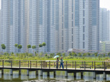 People on Walking Trail Through the Hong Kong Wetland Park, Tin Shui Wai, New Territories