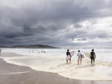 Young Surfers Entering Sea at Meron Beach