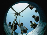 Locals Look Down the Newly Completed Well in St Louis