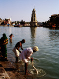 Buy Man Washing Clothes in Holy Bathing Tank, the Ramkund at AllPosters.com