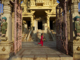 Child Running Past Entrance to Jain Temple