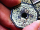 Holding an Ancient Qing Dynasty Coin