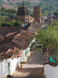 Cobblestone Street with Colonial Houses and Catedral De La Inmaculada Concepcion in Background