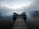 Chairs on Jetty on Mist Shrouded Lake