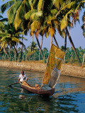 Buy Man Paddling Small Canoe with Sail Near Ayiramthengu at AllPosters.com