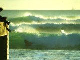 Green Afternoon Waves Off the Wall at Waikiki with a Boogie Boarder on the Side at the Wall