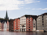 Historic Wooden Houses in Bryggen on Nidalva River with Nidaros Cathedral Spire in Background