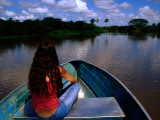Woman in Bow of Boat on Cano Mata'E Rancho, Hato La Fe Ecotourist Ranch