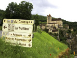 Buy Tourist Signs Outside Village of St. Cirq Lapopie at AllPosters.com