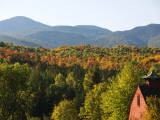 House in Style of Traditional Barn in the Adirondacks in Autumn