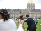 Buy Wedding Couple Kissing with Les Invalides in Background at AllPosters.com