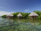 Buy Cabins on the Tropical Waters of Coral Key, Bastimentos Marine Park at AllPosters.com